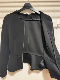 Sale H&M Divided Black blazer with front zipper.