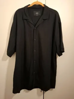 House Black short sleeved buttonup loose fit