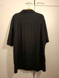 House Black short sleeved buttonup loose fit