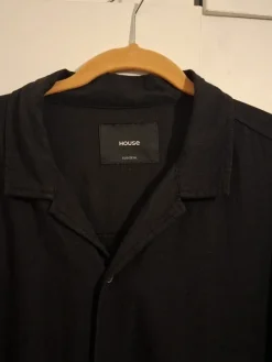 House Black short sleeved buttonup loose fit