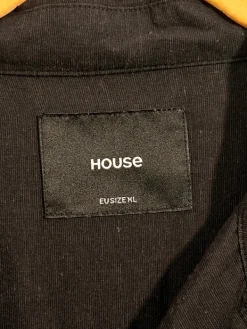 House Black short sleeved buttonup loose fit
