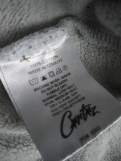 Harmaa Corteiz huppari