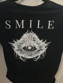 larcenia roe Smile T-Shirt