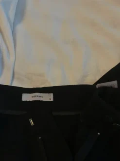 Clearance Leveät mustat housut