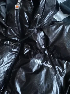 Hot Ellesse Musta glitter toppatakki