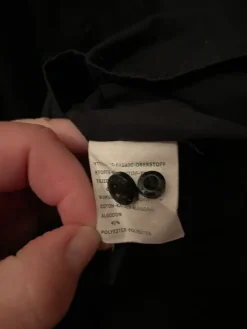 Sale Melka Musta kauluspaita rintataskulla