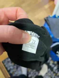 Outlet Musta trikoohaalari