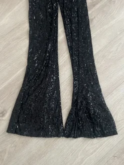 New Bik Bok Mustat paljettihousut levenevillä lahkeilla