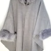 Outlet poncho with a faux fur trim on the hood and cuffs.