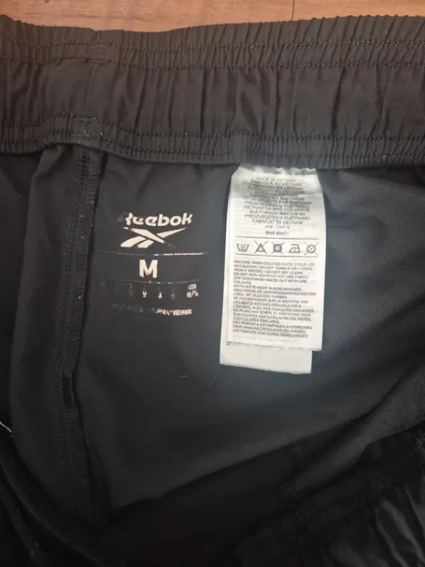 Online Reebok Miesten ohuet urheiluhousut