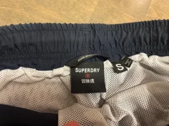 Online Superdry Uima shortsit pojalle